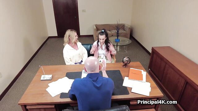 Blonde MILF and petite teen coed with bald PE coach at desk threesome