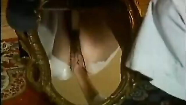 Nun in white habit bent over mirror for priest anal fisting