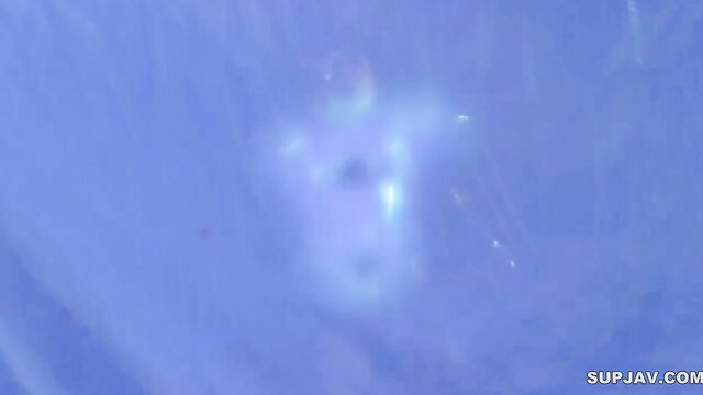 Barbie Rous glowing UFO alien silhouette in blue sky adult video