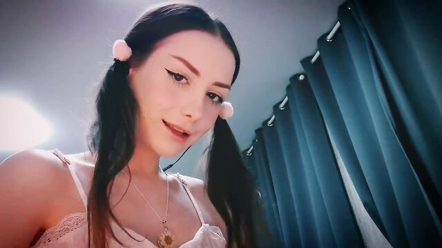 Cute Asian girl with pigtails in lingerie gives oiled handjob ASMR eye contact