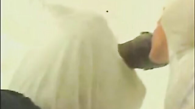 Latina in white hijab deepthroating huge black dick closeup