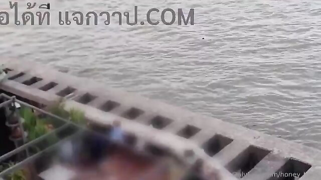 Blurry Thai amateur outdoor balcony by river, unknown model