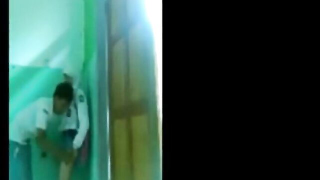 Indo hijab girl in white uniform bent over stairs, teasing shorts upskirt view