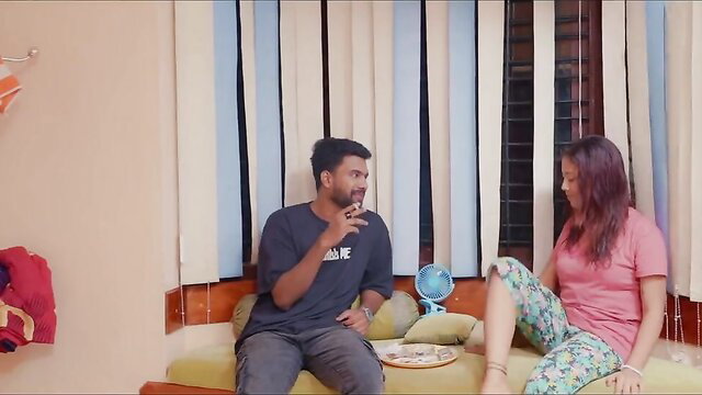 Indian couple in passionate talk on bed, petite beauty with long hair