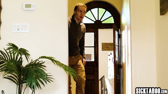 Blond guy peeking at redhead MILF Lauren Phillips in doorway