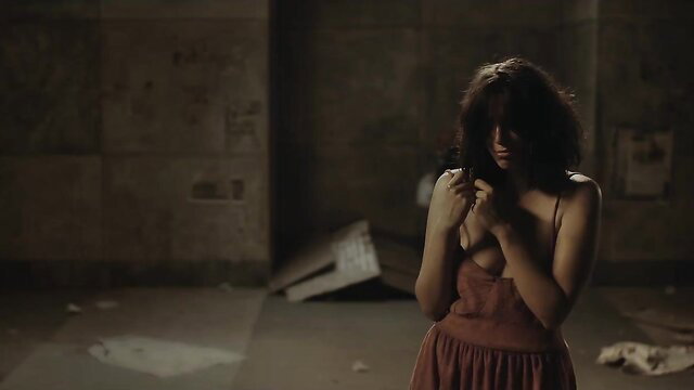 Indira Saturno topless in tense rape scene, nude tits exposed