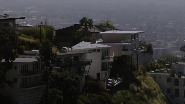 Marley Brinx in LA hills overlooking Hollywood cityscape