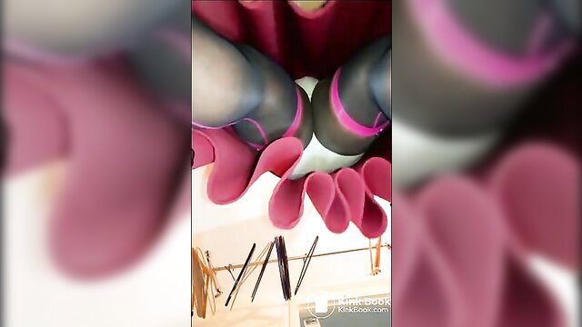 Woman in sheer black stockings and pink rubber gloves POV crotch view