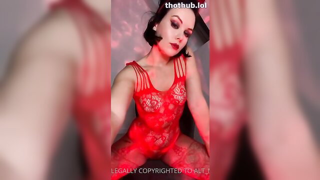 Mel @alt_m teases in red lace lingerie, demonic makeup, pale goth beauty