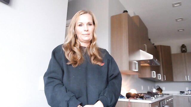 Blonde MILF in oversized sweatshirt in kitchen, porn mom memory loss