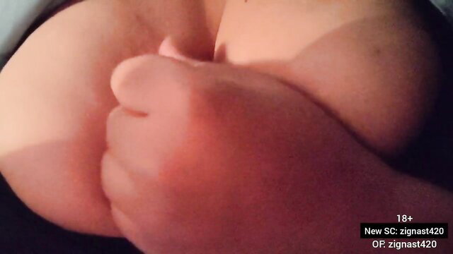 Busty woman squeezing huge tits in femdom JOI tease