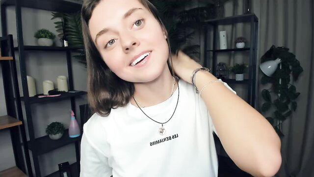 Cute teen Laura Mutti smiling in tight white tee, Chaturbate beauty