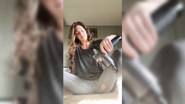 Brunette MILF accidentally vibes pussy with massage gun on TikTok live