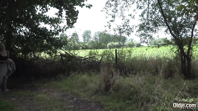 Adriana Sweet blonde nude in field, bare feet outdoor tease OLDJE