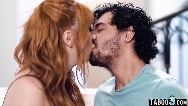 Redhead Lauren Phillips passionately kisses handsome man in taboo scene