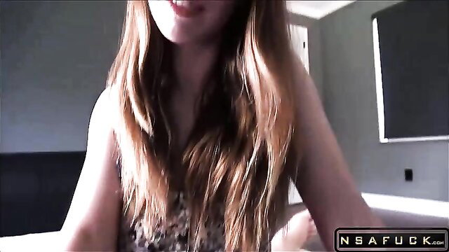 Sweet redhead stepmom in leopard top smiles teasingly at camera