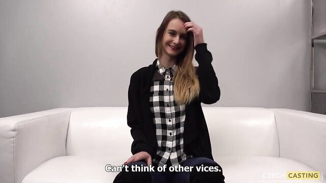 Czech newcomer teen in checkered shirt smiles on couch in intimate debut