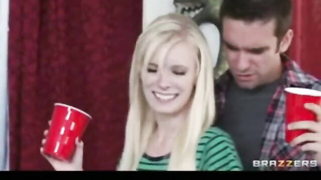 Blonde busty MILF Nikita Von James holds red cups at party with guy