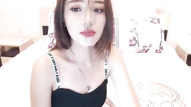 Asian amateur babe in black tank top on bed, sexy bedroom tease