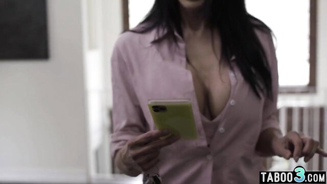 Reagan Foxx in pink blouse deep cleavage holding phone taboo tease