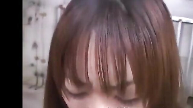 Pretty Asian college girl closeup, helpless and restrained