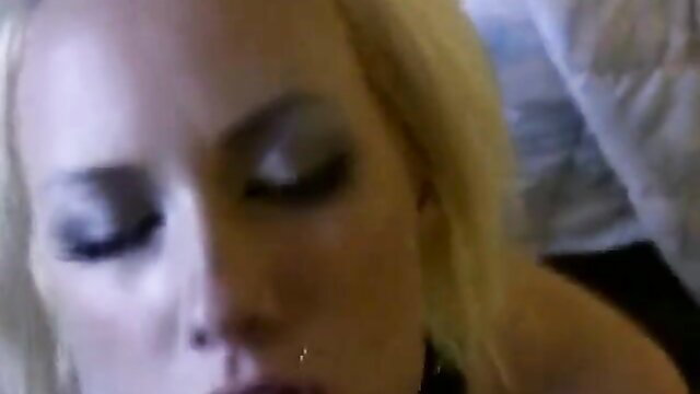 Closeup of slutty blonde's aroused face in hardcore punishment scene