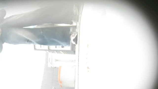 Blurry spy cam toilet view from front to back, anonymous woman peeing