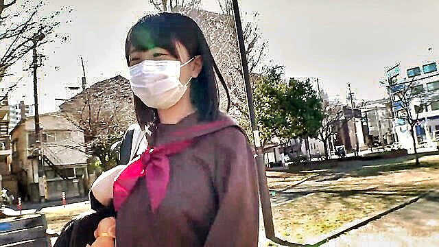 Masked Japanese schoolgirl with big tits hinted under uniform, plain face erotic reveal