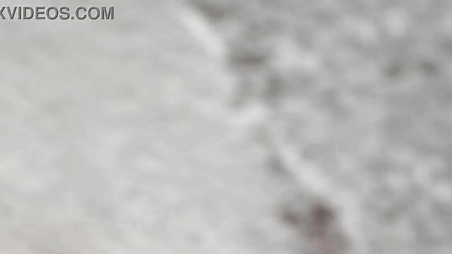 Blurry girl bathing in tub, wet nude body closeup