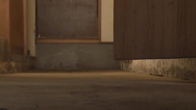 Japanese wife slut in dim room by wooden walls and window