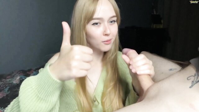 Blonde babe Alice gives thumbs up while stroking cock in hot handjob