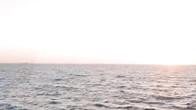 Serene ocean sunset view, perfect vacation backdrop for anal sex