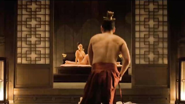 Nude Asian woman on bed watched by muscular shirtless man in ancient robes