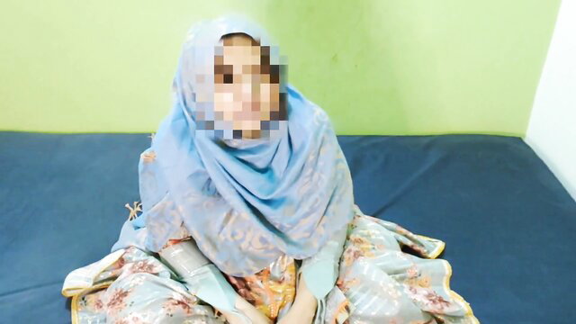 Desi hijab girl in blue scarf sits on bed, aged GF step-sis tease