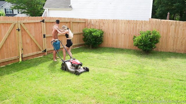Nude muscular guy and blonde MILF fucking outdoors by mower