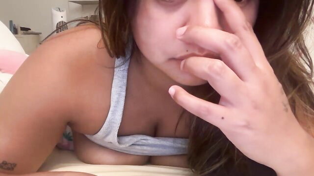 Filipinamango pinching nose in tight tank top, big tits spilling out