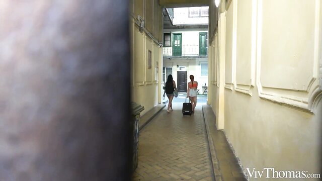 Marina Gold in Romantic Getaway, walking alley with suitcase