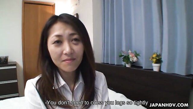Asian wife Noriko Sudo in tight white blouse, uncross legs