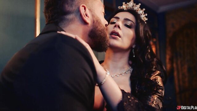 Sam Bourne kisses busty brunette queen in sultry Digital Playground scene