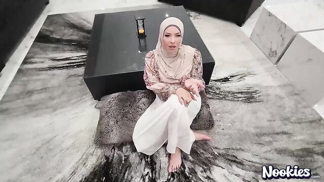 Mandy Waters in sexy hijab sitting barefoot, nude feet tease