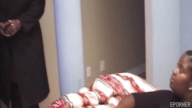 Black lesbian woman lying nude on bed with huge tits in hot scene