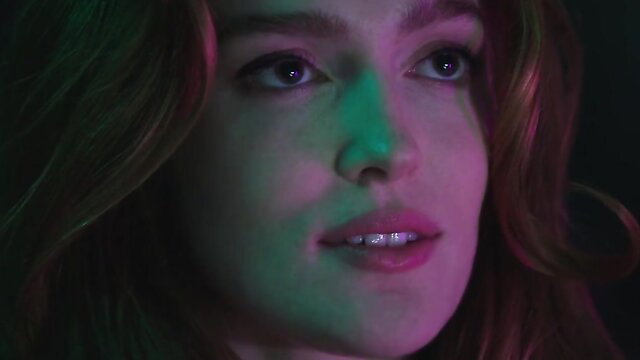 Beautiful redhead Jia with green glow lighting in hot lesbian thumbnail