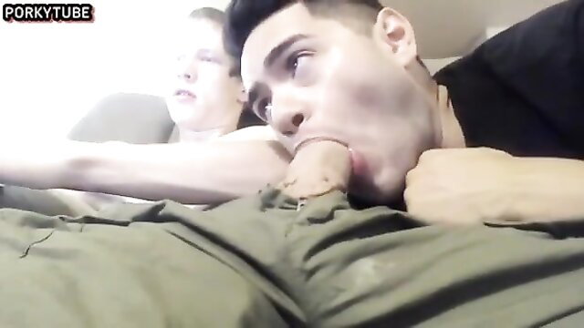 Two young men chilling at home, one sucking cock intimately close-up