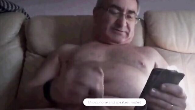 Spanish grandpa wanking hard on phone, shirtless solo masturbation