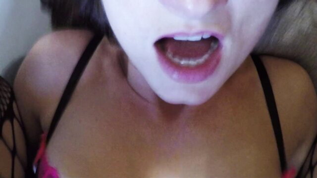 Asian housewife in lingerie opens mouth wide closeup