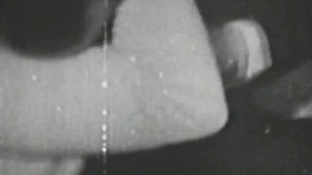 Vintage B&W blowjob with retro lady's sultry touch