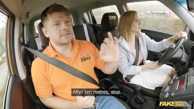 Michael Fly instructs blonde in car driving lesson passion