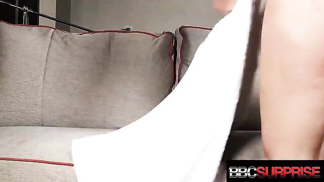 Big boobed shaved bush squirter Olivia in towel tease