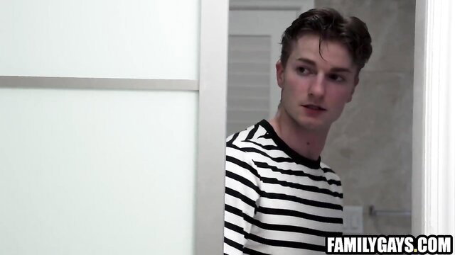 Hot stepdad and stepson peeking from shower door in steamy gay scene