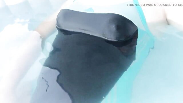 HD tranny in hot one-piece swimsuit jerking in jacuzzi